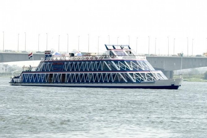 2-Hour Nile River Dinner Cruise From Cairo - Boarding a Nile boat for dinner