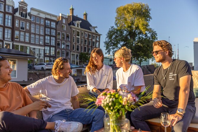 Amsterdam 2 Hour Small-Group Canal Cruise with Dutch Snacks & Bar - Huis Bartolotti and the Munttoren