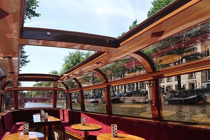 Amsterdam 2 Hour Small-Group Canal Cruise with Dutch Snacks & Bar - Snacks, drinks, and staying warm