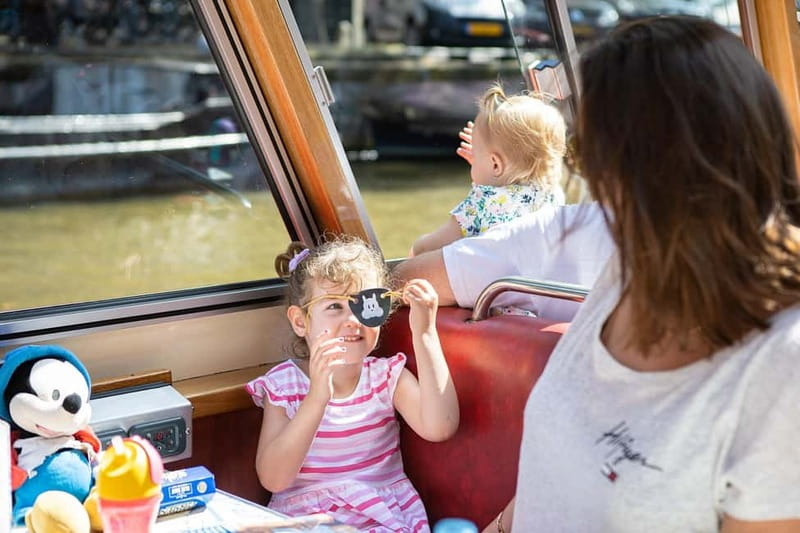Amsterdam: 75 Minute City Canal Cruise with Audio Guide - Audio guide, live commentary, and the kids’ option