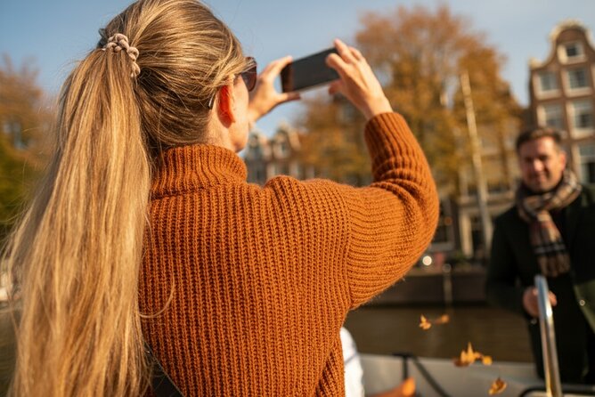 Amsterdam 90 minutes Canal Cruise with bar and snacks on board. - Drinks, snacks, and the practical value of $24.19