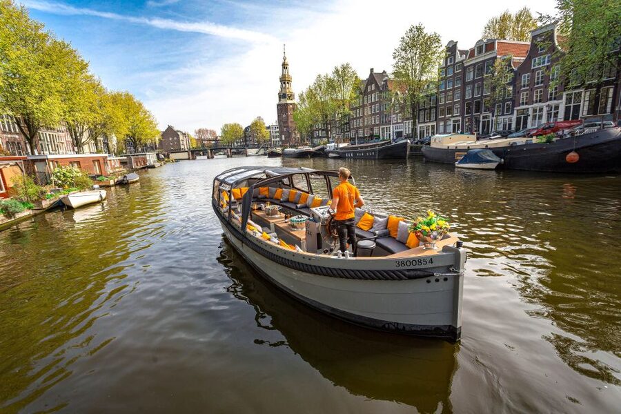 Amsterdam: Canal Belt Private Beer Boat Tour - Beer, cushions, and the right kind of party
