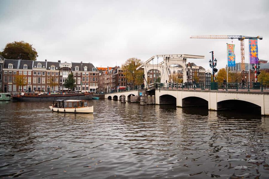 Amsterdam Canal Boat Tour with Live Guide - The boat, roof, and weather plan
