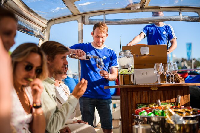 Amsterdam: Canal Booze Cruise with Unlimited Drinks Option - Drinks, food, and the real value of the price