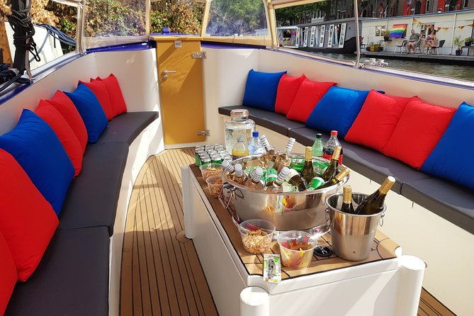 Amsterdam: Canal Booze Cruise with Unlimited Drinks Option - The Skinny Bridge is a highlight from the water