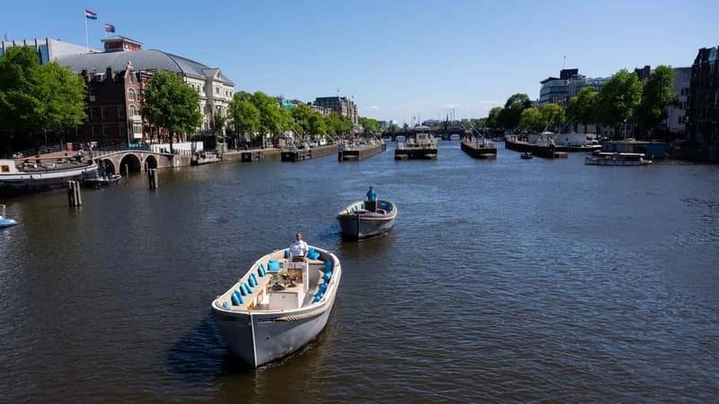 Amsterdam: Canal Cruise in Open Boat with Drink Option - Why Amsterdam’s canals are worth seeing from a boat