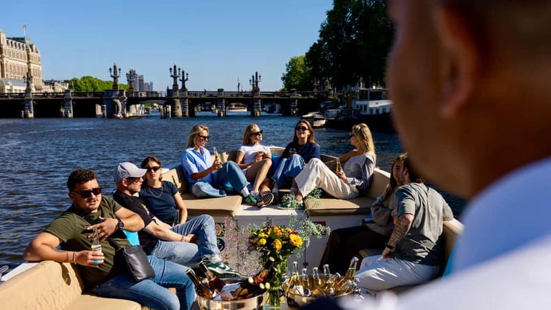 Amsterdam: Canal Cruise in Open Boat with Drink Option - Westerkerk, Prinsengracht, and the Nine Streets