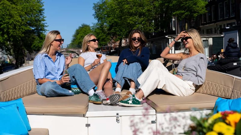 Amsterdam: Canal Cruise in Open Boat with Drink Option - Sunset, daytime, or a drink on board