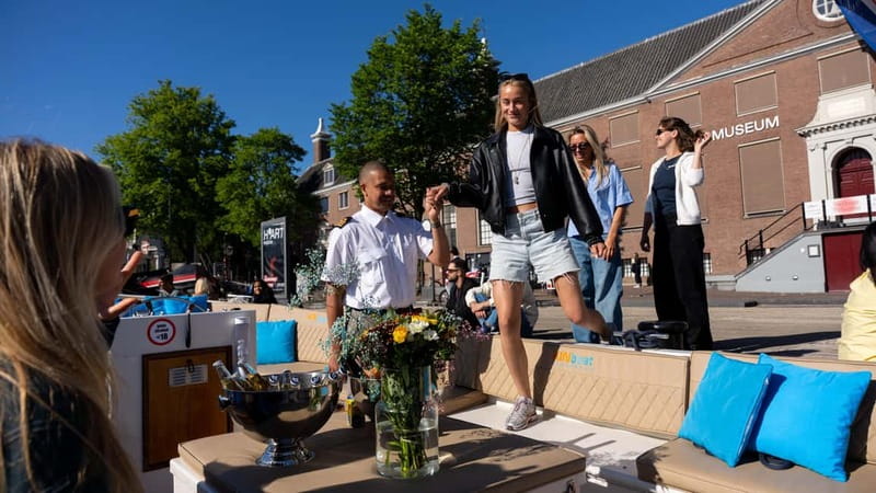 Amsterdam: Canal Cruise in Open Boat with Drink Option - Choosing between Central Station and the Anne Frank House