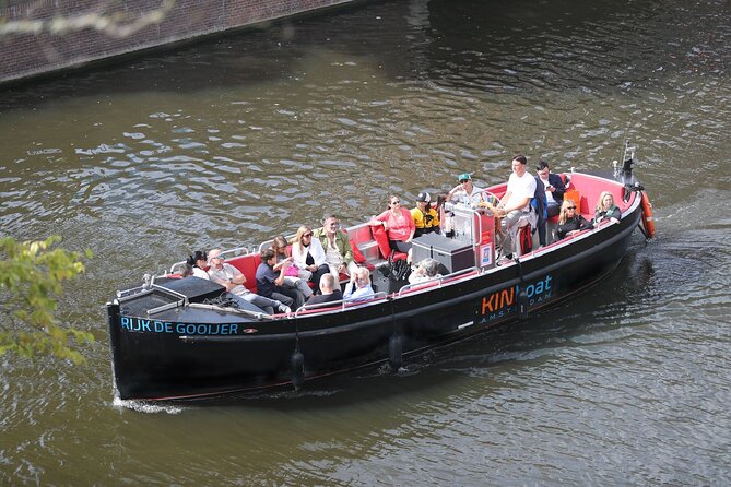 Amsterdam Canal Cruise in Open Boat with Unlimited Drinks Option - Small canals, bridges, and the value of an open boat