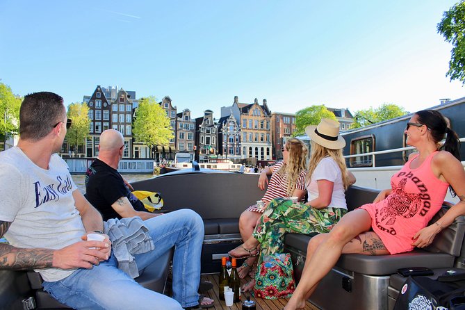 Amsterdam Canal Tour by Open Boat – 90 min Small Group Experience - Meeting at Nieuwe Keizersgracht 1