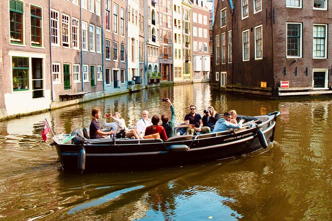 Amsterdam Canal Tour by Open Boat – 90 min Small Group Experience - The green edge of the city
