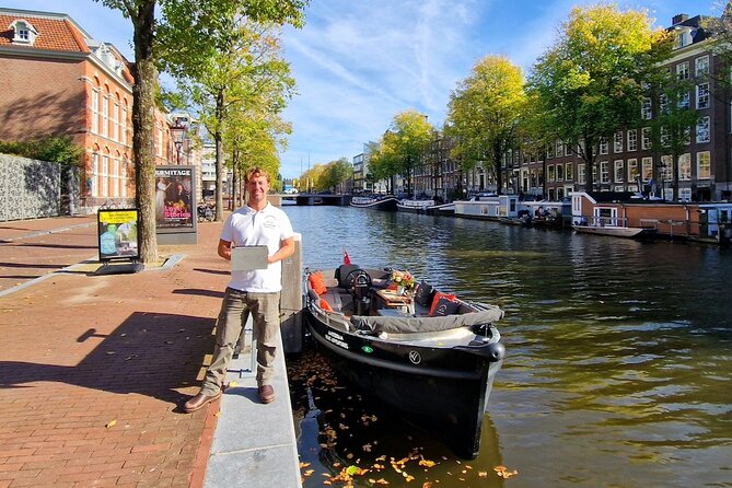 Amsterdam Canal Tour by Open Boat – 90 min Small Group Experience - Seven Bridges and the Prinsengracht