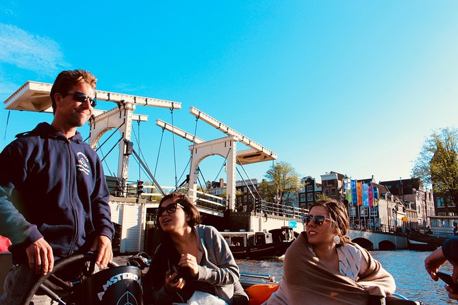 Amsterdam Canal Tour by Open Boat – 90 min Small Group Experience - From the Amstel to the dancing houses
