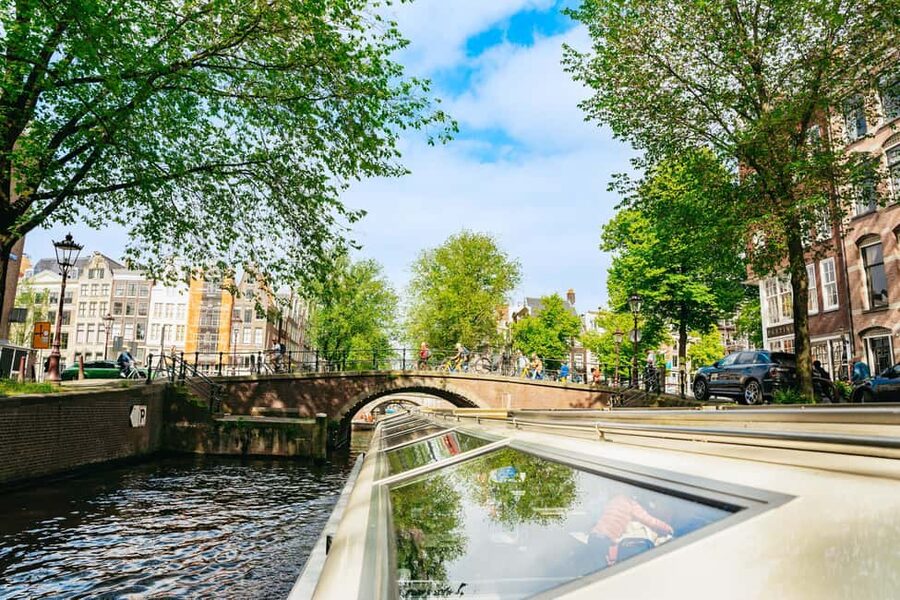 Amsterdam: City Canal Cruise and Rijksmuseum - Boarding the canal cruise at two city docks