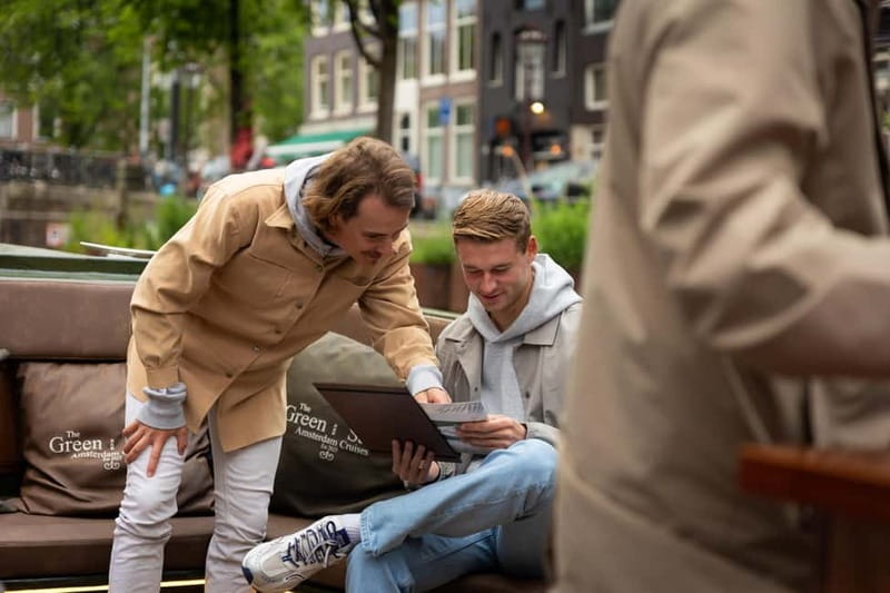 Amsterdam: Covered Heated Canal Cruise with Bitterballen - The first hour: canals, stories, and a relaxed pace