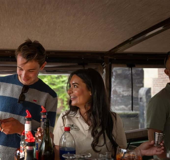 Amsterdam: Covered Heated Canal Cruise with Bitterballen - The hosts add the local layer