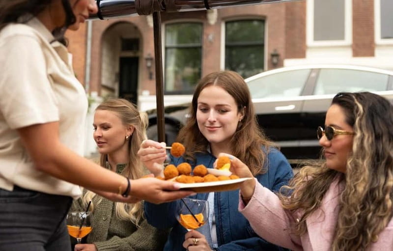 Amsterdam: Covered Heated Canal Cruise with Bitterballen - Who should book the Green Saloon cruise?