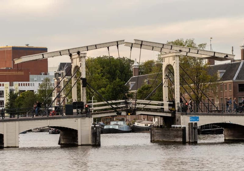Amsterdam: German Canal Cruise with Unlimited Drinks Option - Herengracht and the canal belt