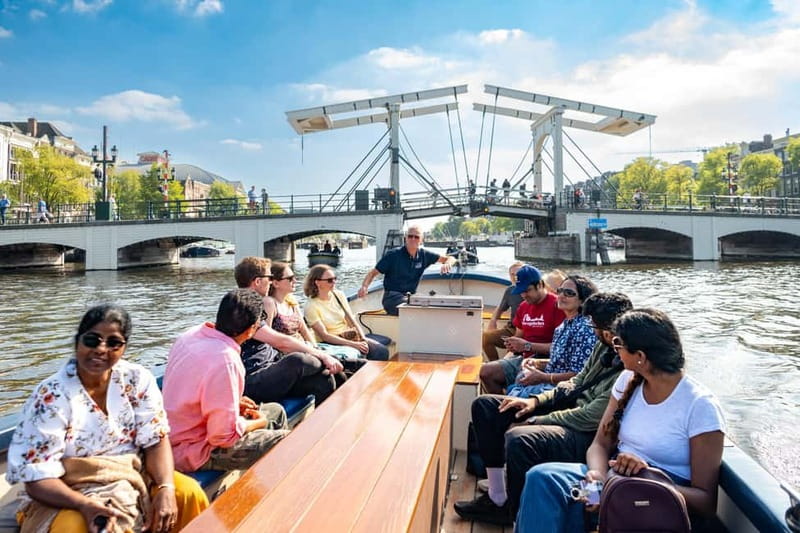 Amsterdam: Guided City Highlights Open Boat Canal Cruise - From Hard Rock Cafe to Holland Casino