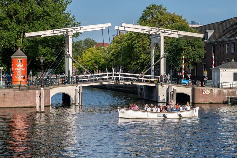 Amsterdam: Guided City Highlights Open Boat Canal Cruise - Centraal Station and the Grachtengordel