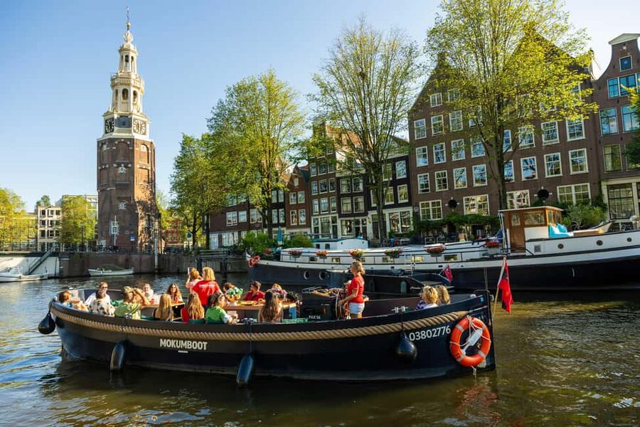 Amsterdam: Guided Open Boat Canal Cruise Including Drink - Westerkerk, the Anne Frank House, and the final stretch