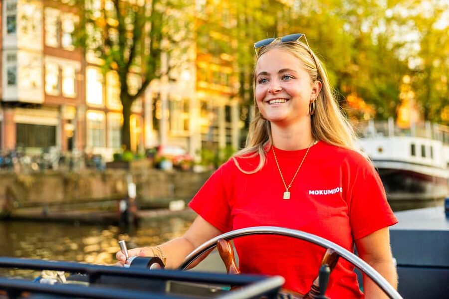Amsterdam: Guided Open Boat Canal Cruise Including Drink - NEMO and the maritime side of the city