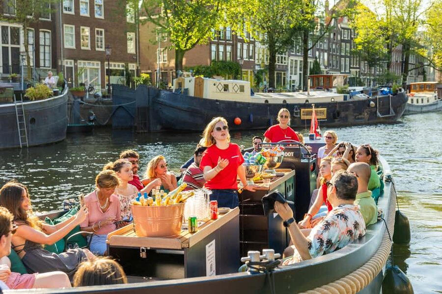 Amsterdam: Guided Open Boat Canal Cruise Including Drink - The canal belt: Herengracht to Reguliersgracht