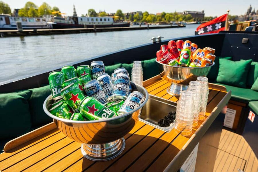 Amsterdam: Guided Open Boat Canal Cruise Including Drink - Meeting at Central Station