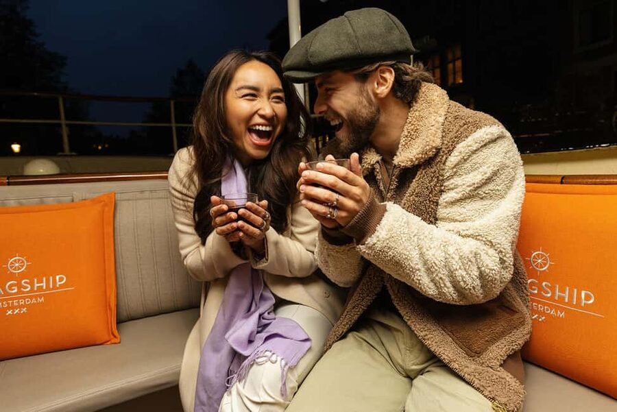 Amsterdam: Heated Canal Cruise with Unlimited Drinks & Bite - Heated boats, open boats, and changing weather