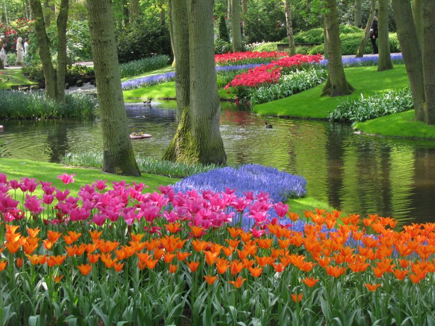 Amsterdam: Keukenhof Ticket with Shuttle Bus + Canal Cruise - Seeing Amsterdam from a 75-minute canal boat