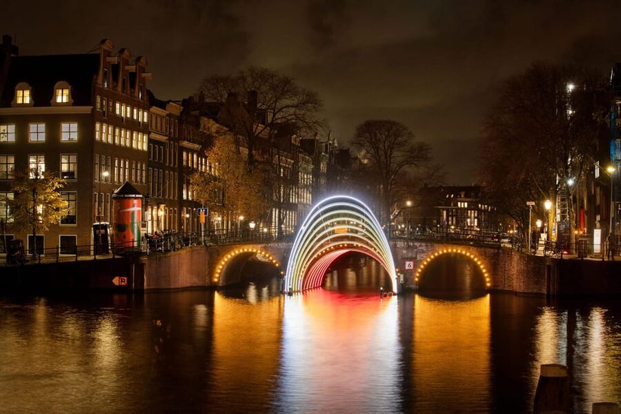 Amsterdam: Light Festival Canal Cruise w/Snack and Hot Drink - Boarding outside Amsterdam Central Station