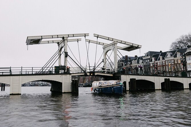 Amsterdam Newest Canal Cruise with local guide and small group - Leaning houses, old churches, and the city center