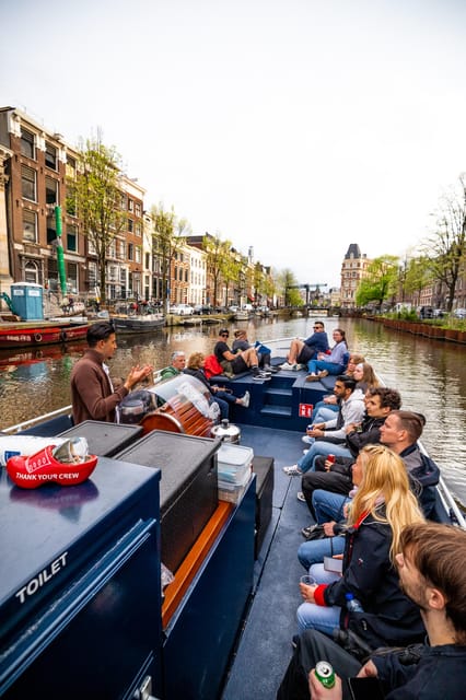 Amsterdam:Old City Canal Cruise with Live Guide and Open Bar - What the open boat changes
