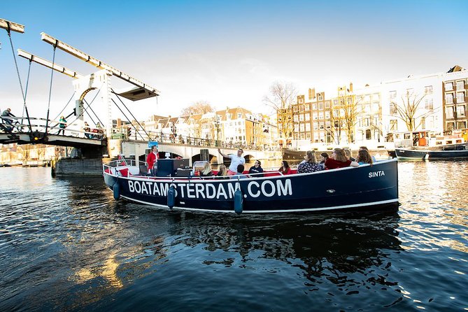 Amsterdam Open Boat Cruise with Live Guide and Two Drinks - Drinks, weather, and comfort on board