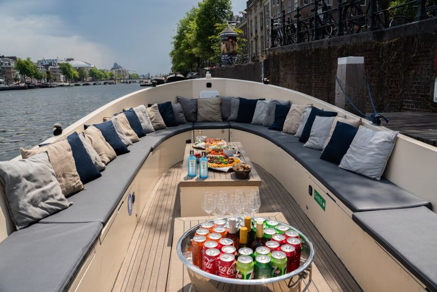 Amsterdam: Private Canal Booze Cruise with Unlimited Drinks - Key points at a glance
