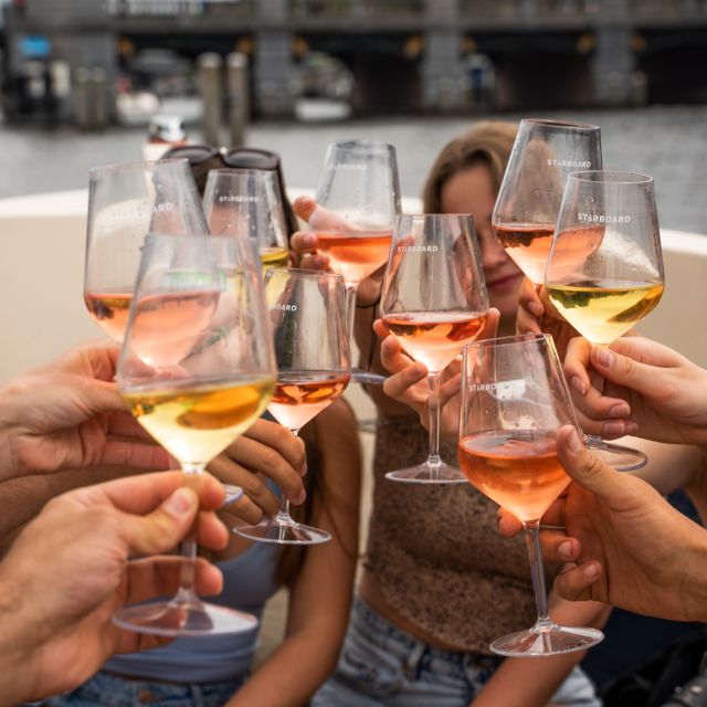 Amsterdam: Private Canal Booze Cruise with Unlimited Drinks - The Red Light District from the water