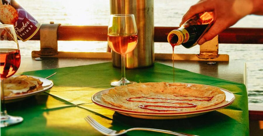 Amsterdam: River Cruise With All-You-Can-Eat Dutch Pancakes - Boarding, seating, and the first pancakes