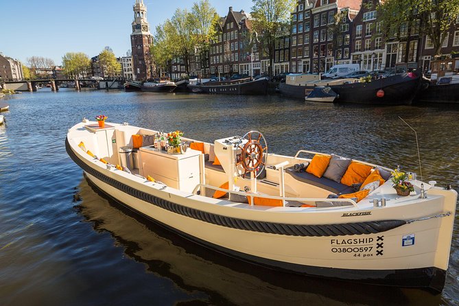 Amsterdam: Saloon Boat Cruise + Unlimited Drinks & Bite option - The Drunken Houses and Amsterdam’s crooked charm