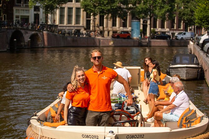 Amsterdam: Saloon Boat Cruise + Unlimited Drinks & Bite option - The bridge view that rewards the right angle