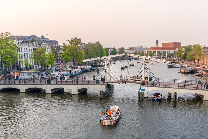 Amsterdam: Saloon Boat Cruise + Unlimited Drinks & Bite option - The one-hour pace and onboard atmosphere