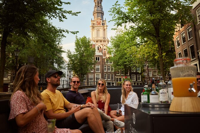 Amsterdam: Saloon Boat Cruise + Unlimited Drinks & Bite option - The Amstel, where the city begins