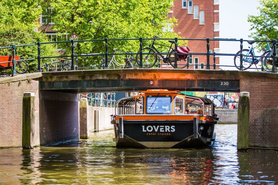 Amsterdam: Semi-Open Canal Boat Cruise - Boarding near Amsterdam Centraal