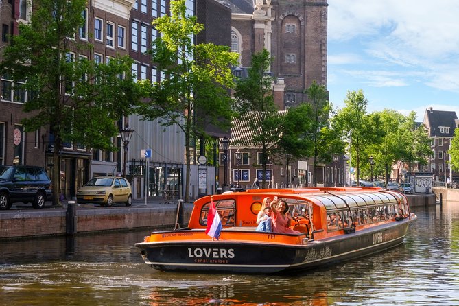 Amsterdam Sightseeing Canal Cruise with Audio Guide - What you see from the glass-topped boat