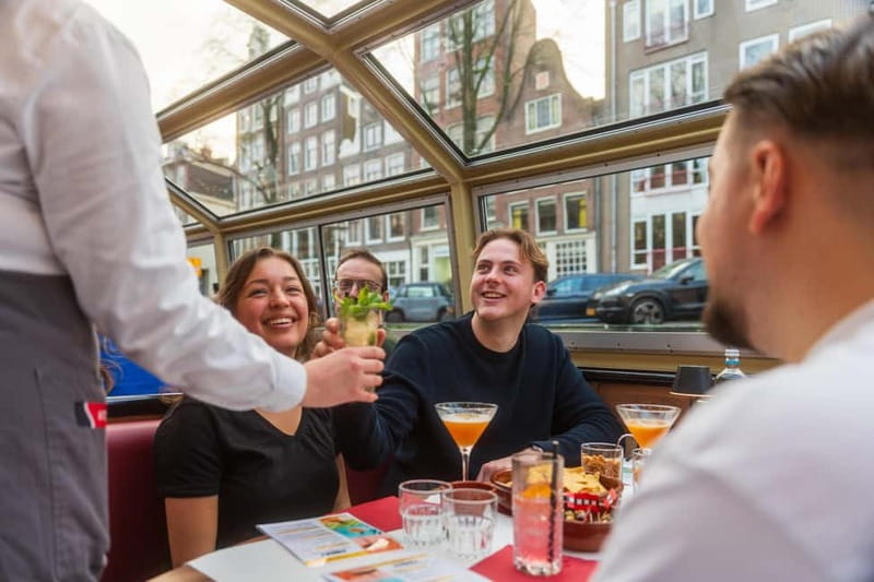 Amsterdam: Unlimited Cocktails Cruise on the Canals - Boarding near Damrak and Amsterdam Centraal