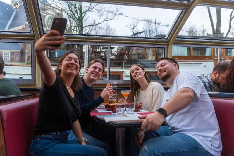 Amsterdam: Unlimited Cocktails Cruise on the Canals - From Amsterdam Centraal to the Magere Brug