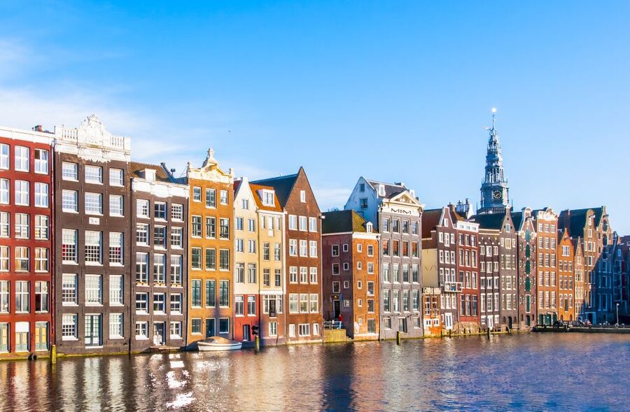 Amsterdam Walking Tour and Canal Cruise - Dam Square and the city’s central symbols