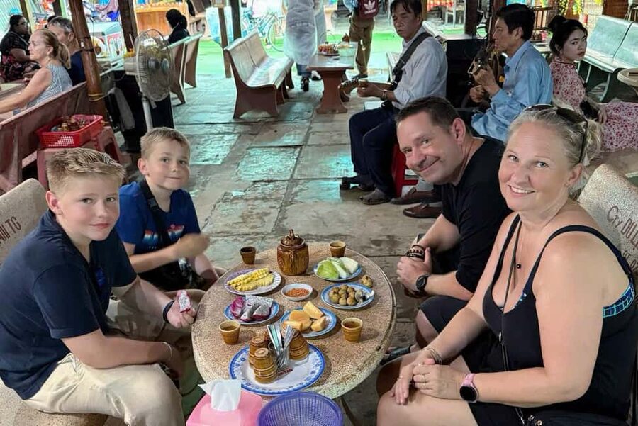 Authentic Mekong Delta: Tuk Tuk, Rowing Boat, Biking Tour - A motorboat across the Tien River