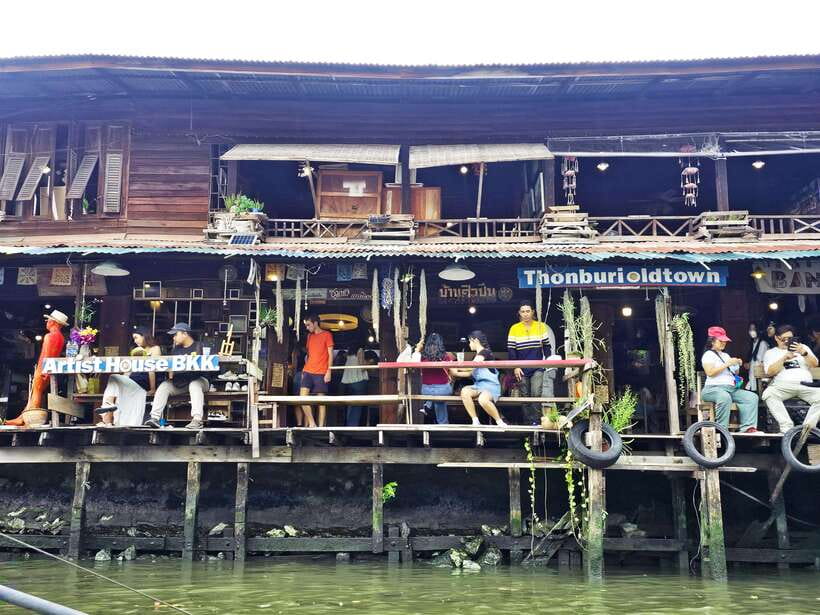 Bangkok Long Boat Canal a Big Buddha & Culture Markets Tour - Seeing Wat Paknam’s giant Buddha from the boat