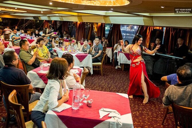 Cairo dinner cruise In Nile River with Belly Dancing and Transpor - Boarding the boat and watching Cairo after dark